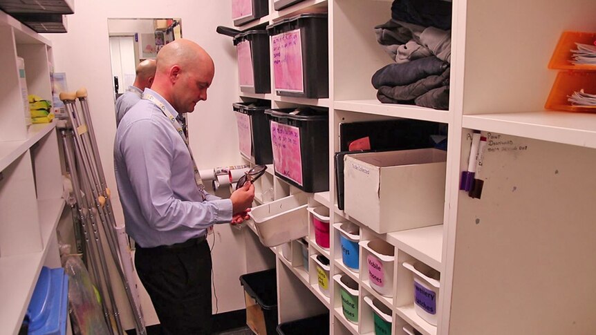 Gold Coast Airport general manager of operations Brett Curtis inspects the Lost and Found