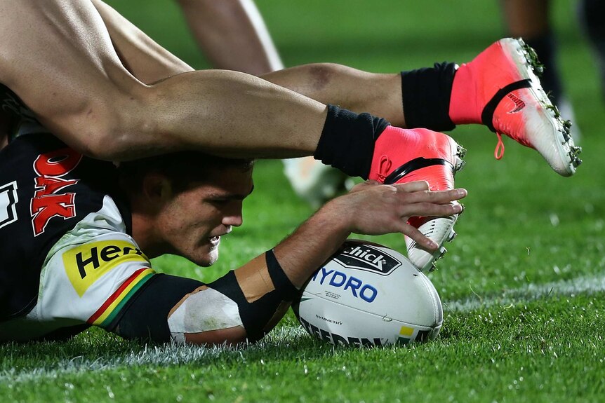 Nathan Cleary slams the ball down against the Warriors