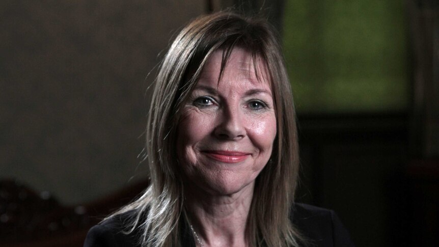 Head shot of Dr Deborah Bateson smiling at the camera