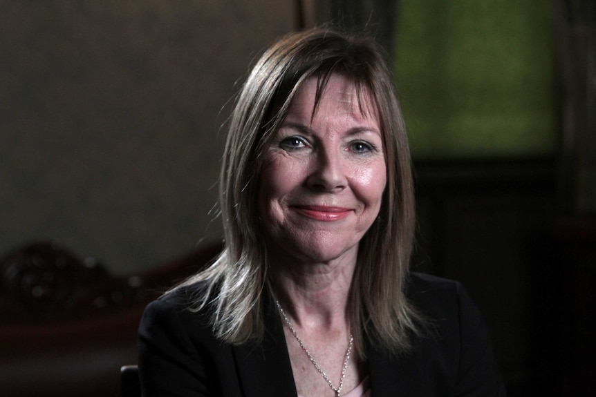 Head shot of Dr Deborah Bateson smiling at the camera