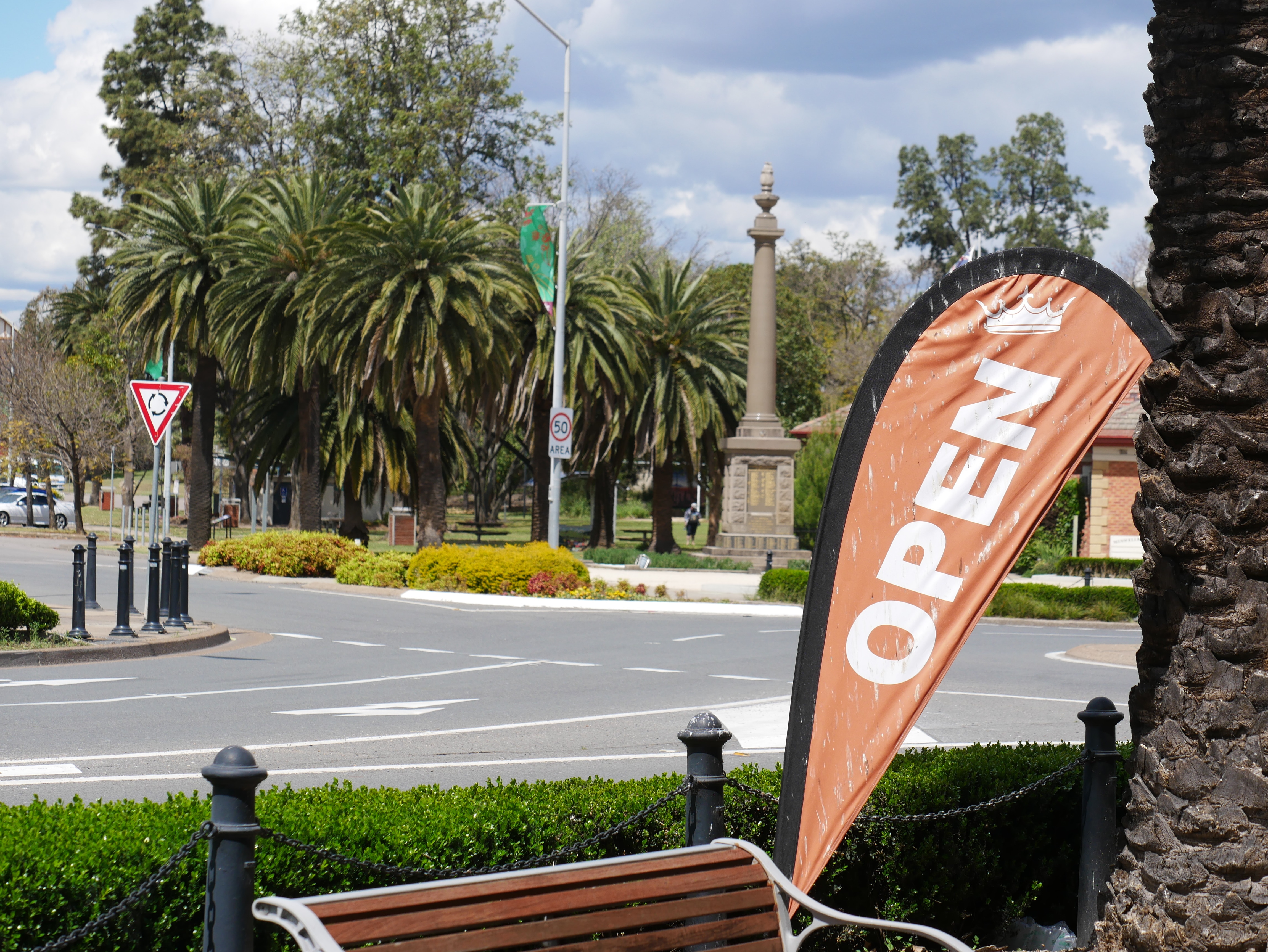 An open sign in front of the main street of Muswellbrook