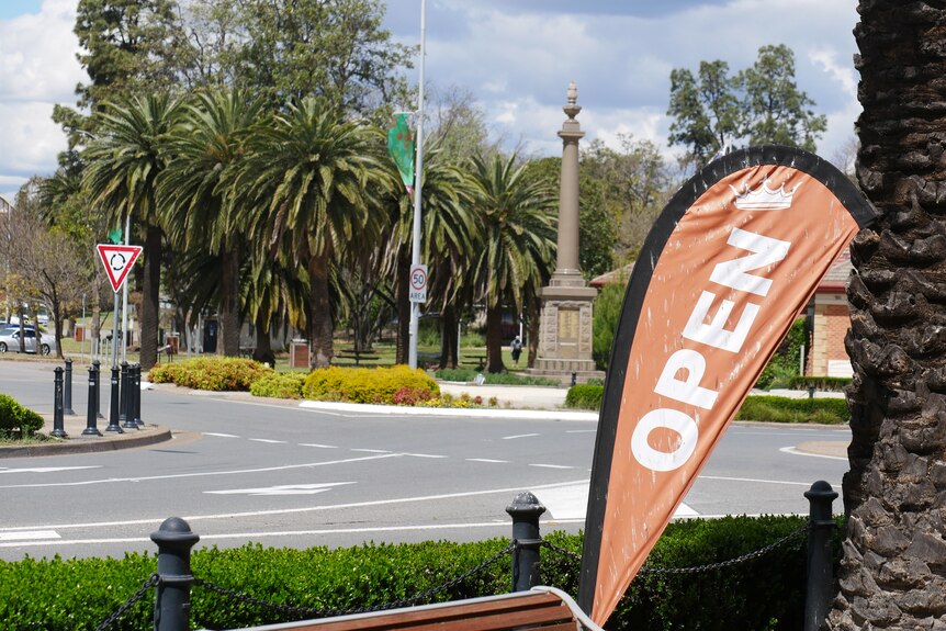 An open sign in front of the main street of Muswellbrook