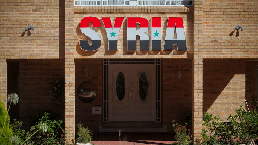 A group of up to 40 men stormed the Syrian Embassy in O'Malley on Saturday night causing extensive damage.