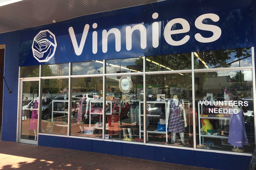 A wide shop of the front of a St Vincent de Paul Society charity  shop.