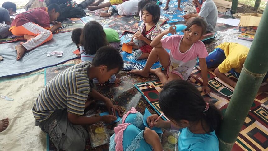 Children on Lombok in a healing camp, August 16, 2018