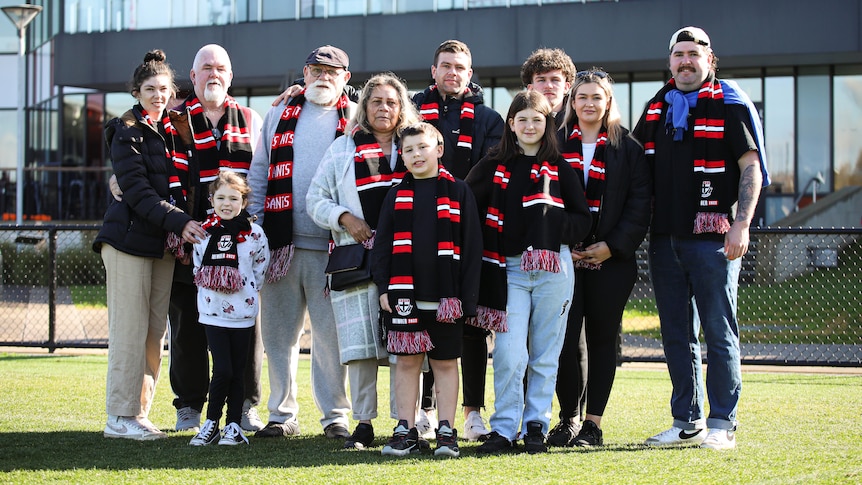 Robert Muir pictured with his family on Moorabbin Oval.