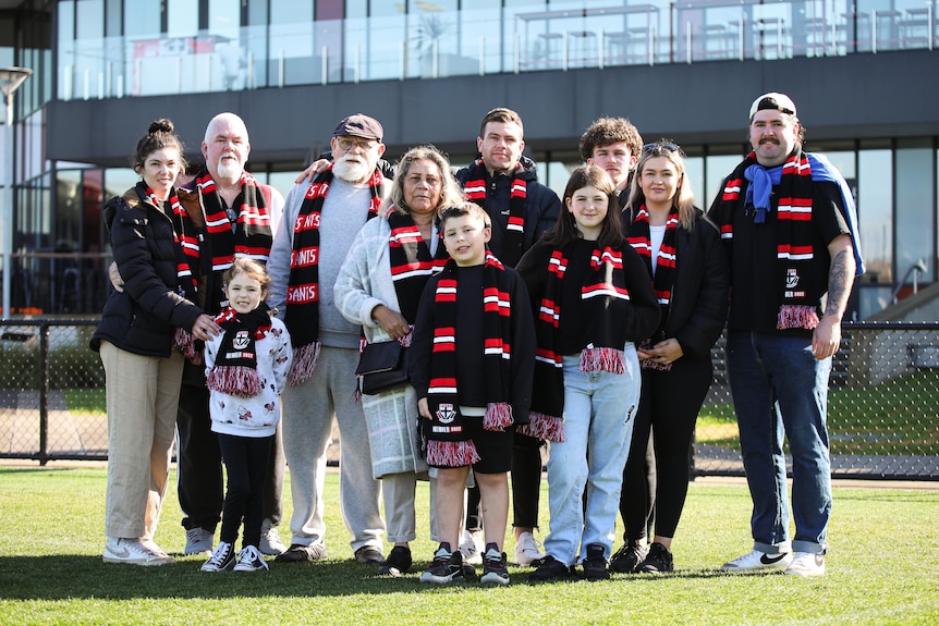 Robert Muir pictured with his family on Moorabbin Oval.