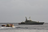 Asylum seekers arrive at Christmas Island on Friday, June 22, 2012.