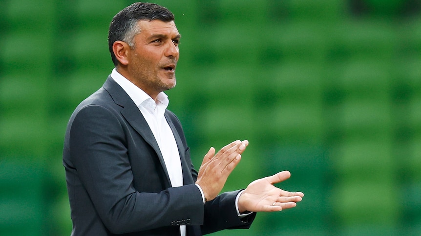 Western United A-League men coach John Aloisi claps his team from the sidelines