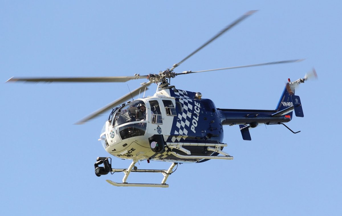Two men accused of shooting at police helicopter during car chase