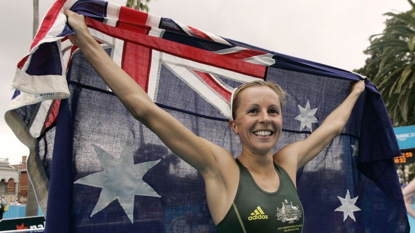 Emma Snowsill celebrates her gold medal