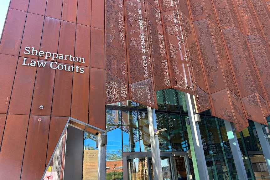 A building with brown designer facade that says Shepparton Law Courts