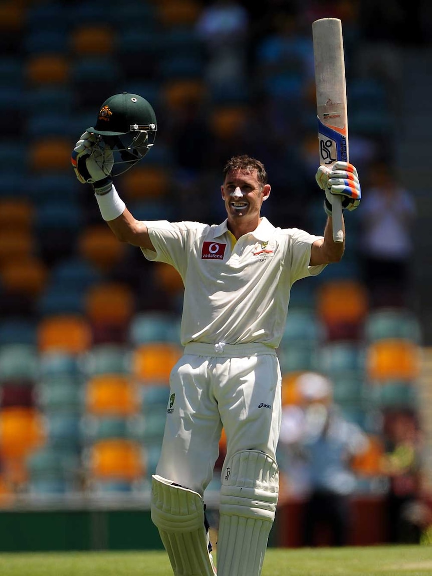 No regrets ... Michael Hussey celebrates bringing up his century against South Africa in Brisbane last month