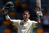 No regrets ... Michael Hussey celebrates bringing up his century against South Africa in Brisbane last month