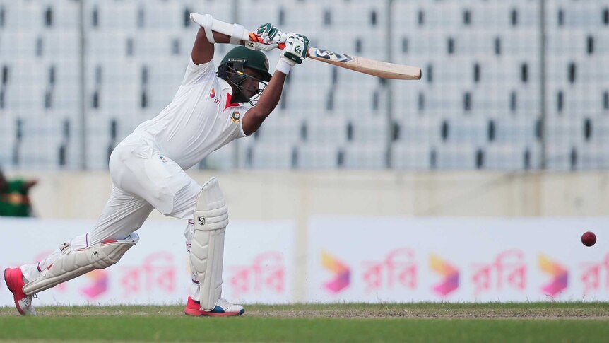Bangladesh's Shakib Al Hasan plays a shot against Australia on day one of the first Test in Dhaka.