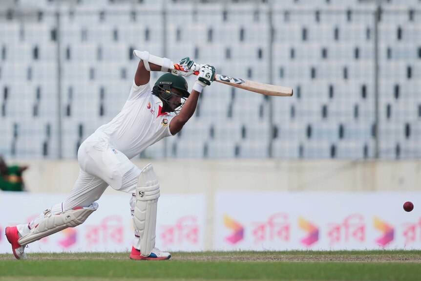 Bangladesh's Shakib Al Hasan plays a shot against Australia on day one of the first Test in Dhaka.