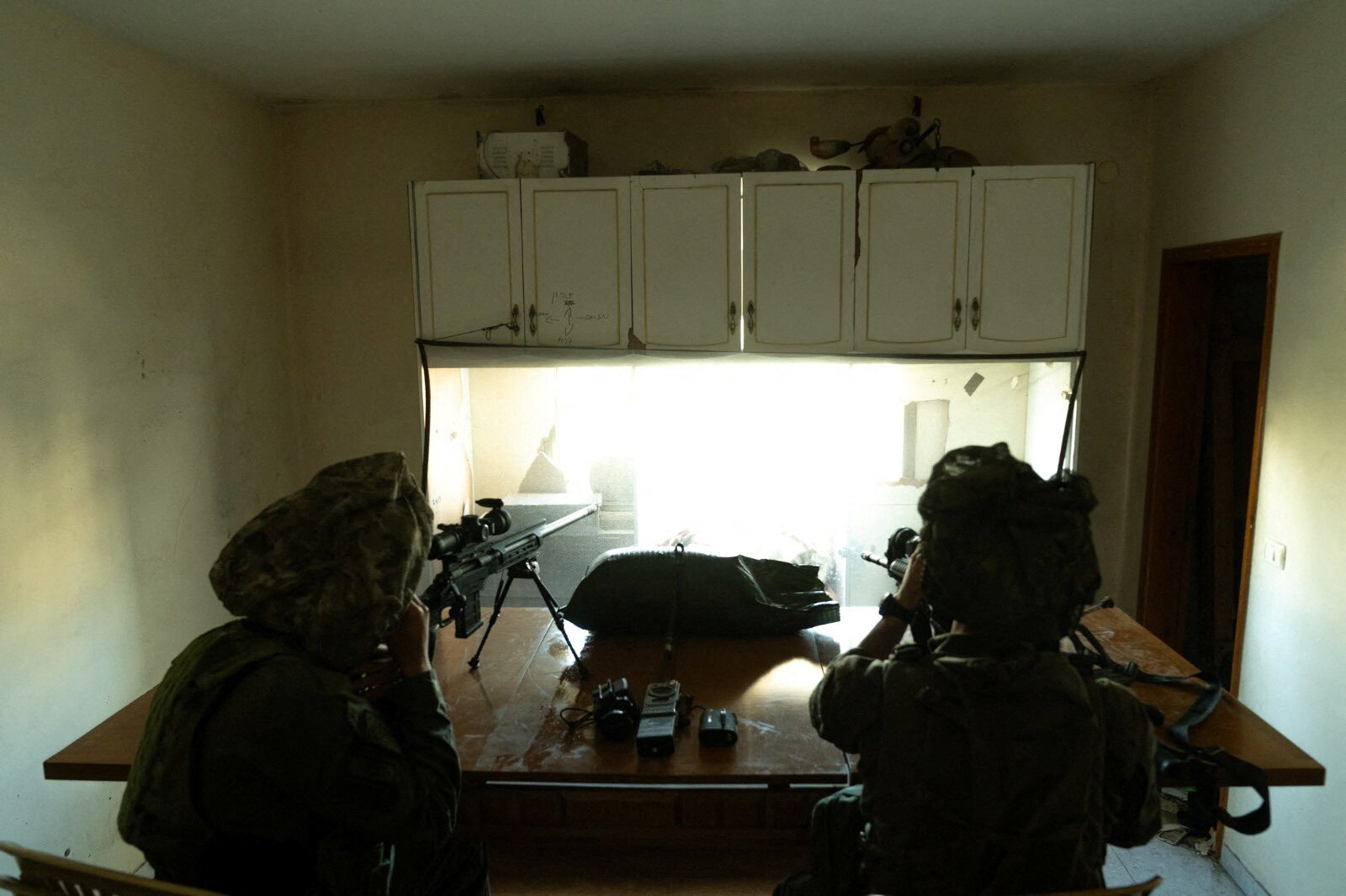 Israeli soldiers operate in the Gaza Strip amid the ongoing conflict.