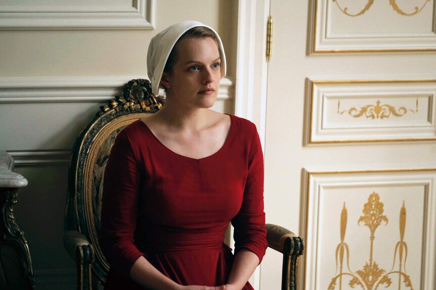 Elisabeth Moss plays Offred in a scene from The Handmaid's Tale.