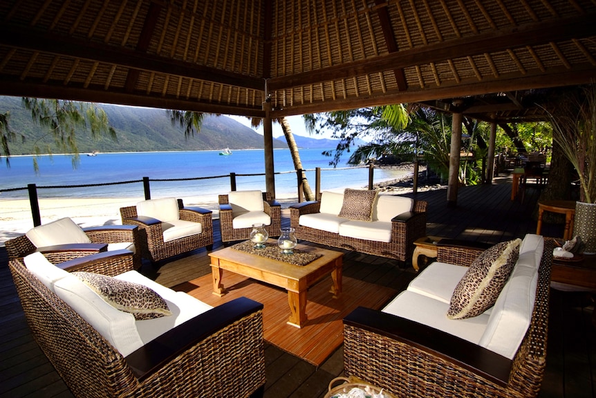 A lounge room looking out to the ocean
