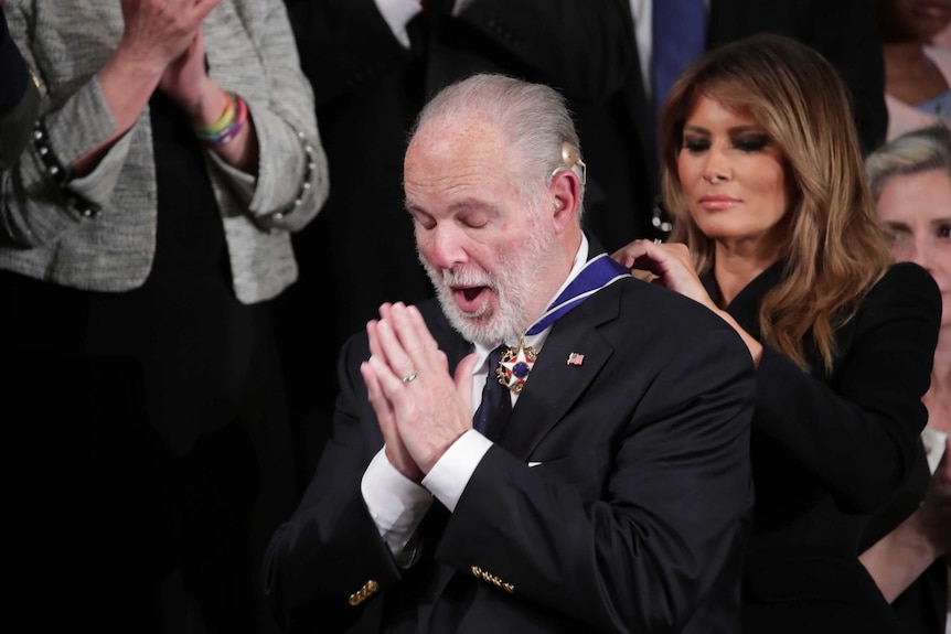 Former first lady Melania Trump places a Presidential Medal of Freedom to Rush Limbaugh.