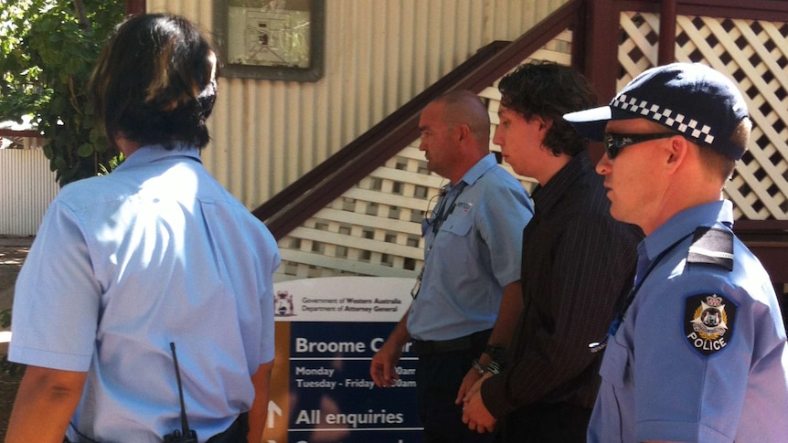 Thomas Camus in handcuffs outside Broome court