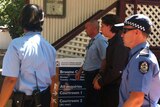Thomas Camus in handcuffs outside Broome court