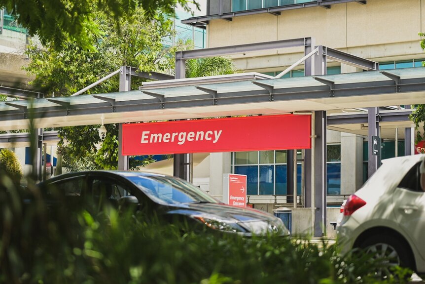 Sign reads Emergency outside a hospital.