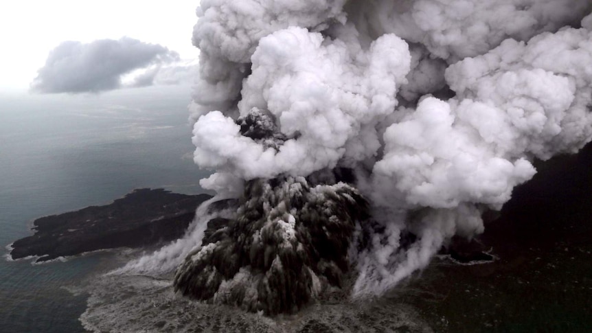 An aerial view shows smoke billowing from the Anak Krakatau volcano in Inodnesia