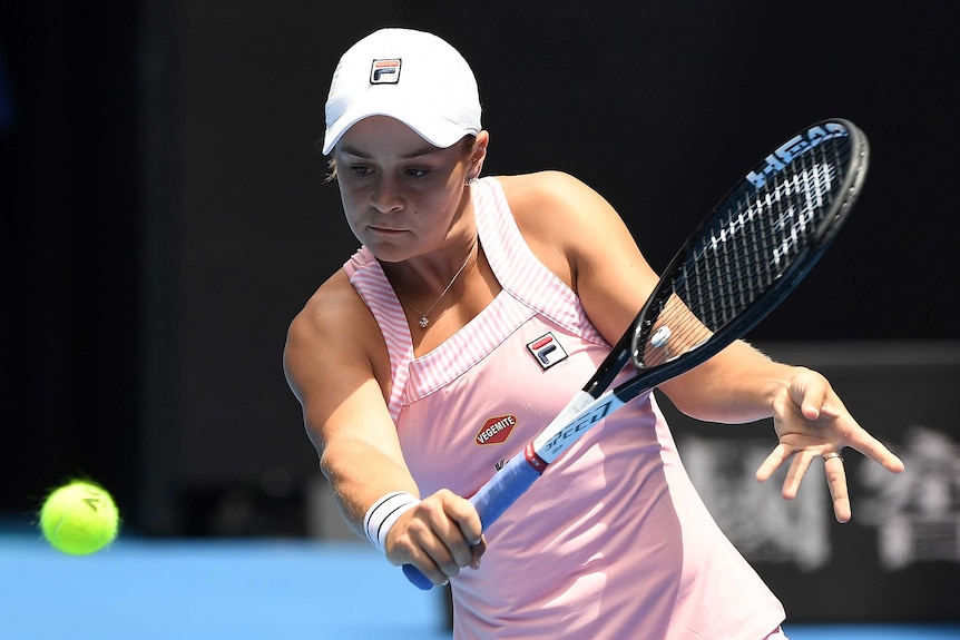 Ashleigh Barty plays a backhand against Maria Sharapova.