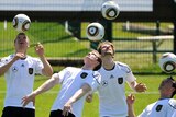 Lukas Podolski (far left) says Germany is preparing an aerial assault on the Socceroos.
