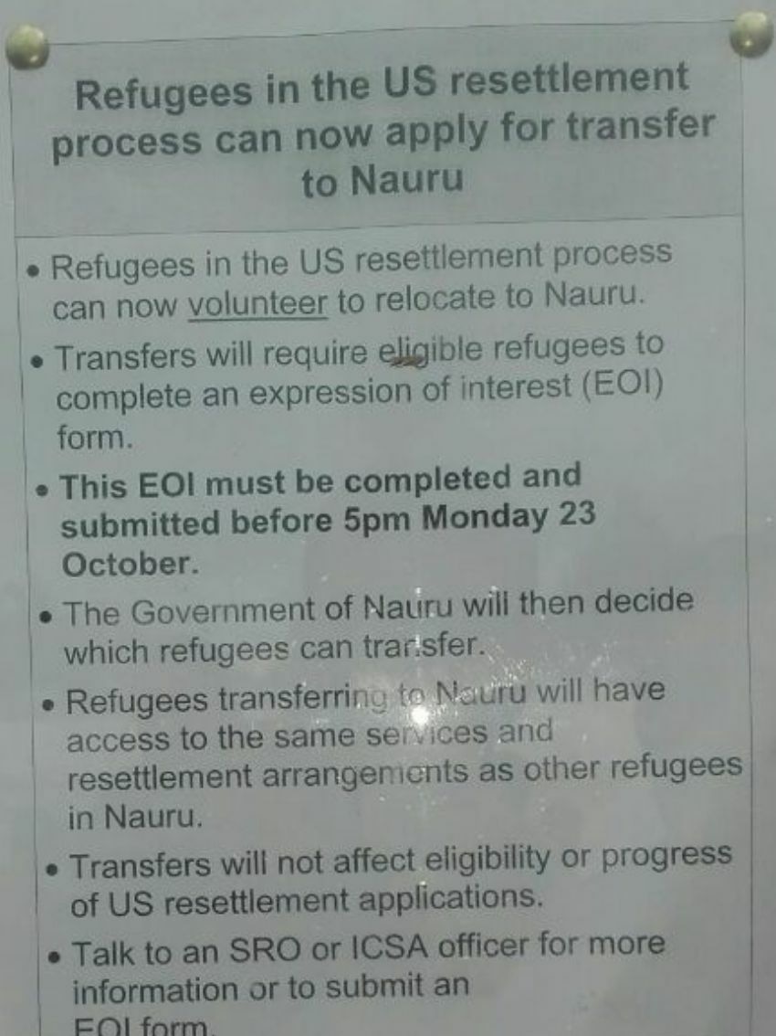 A laminated poster displayed at Manus Island says: "Refugees in the US resettlement process can now apply for transfer to Nauru"