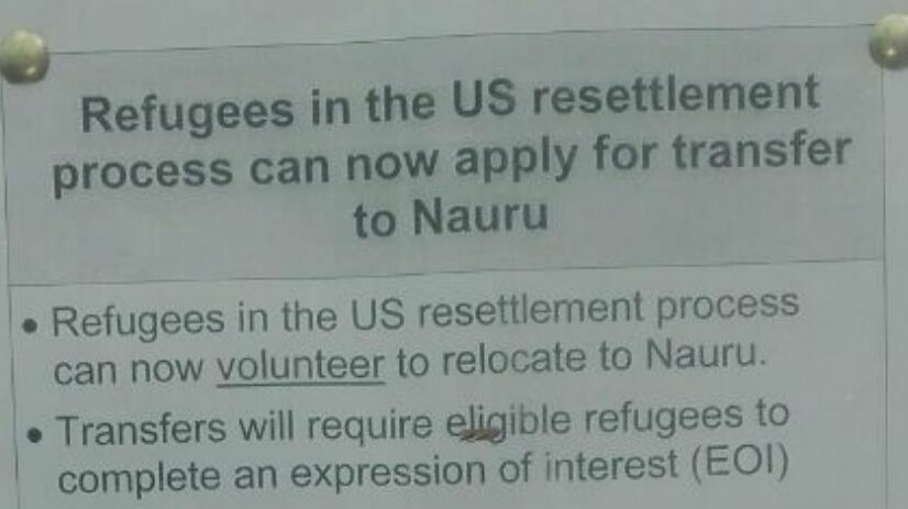A laminated poster displayed at Manus Island says: "Refugees in the US resettlement process can now apply for transfer to Nauru"