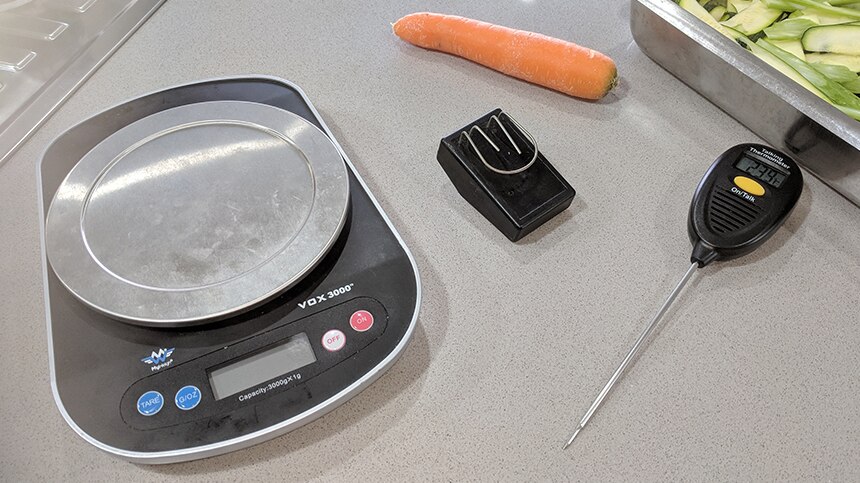 A range of high-tech tools help blind, deaf chef Nate Quinell navigate the kitchen
