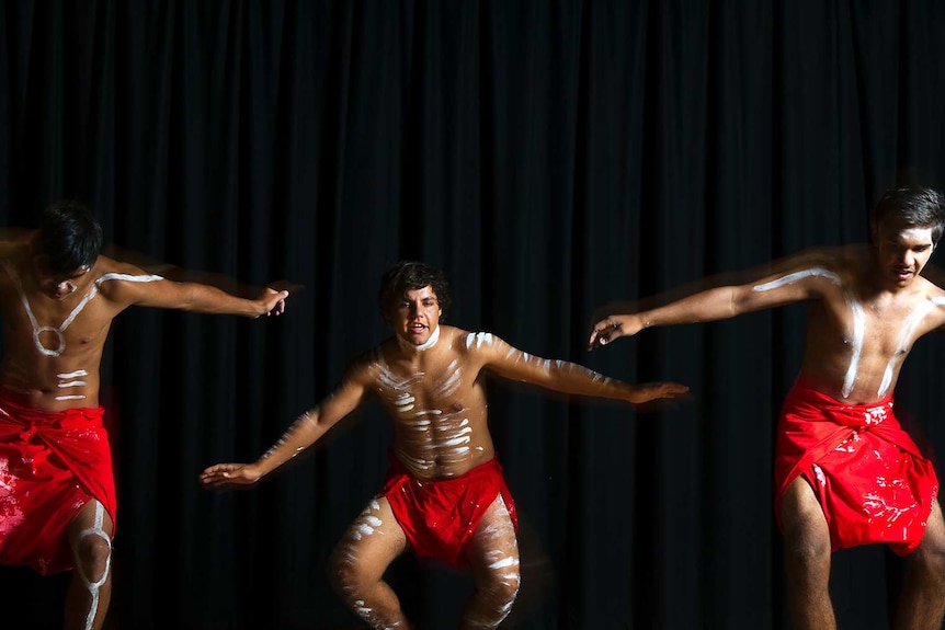 Indigenous students dance during a performance at Bremer State High School in Ipswich.