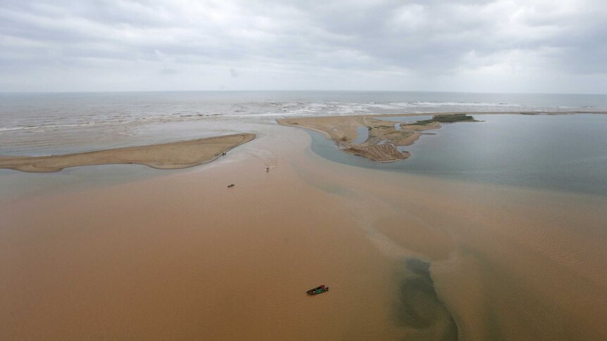 An aerial view of the mouth of Rio Doce