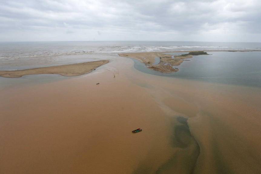 An aerial view of the mouth of Rio Doce