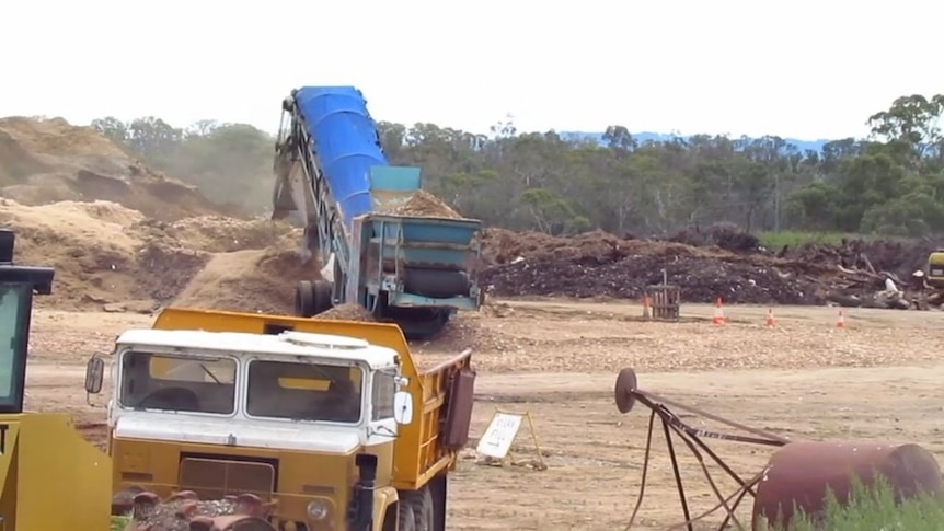 Trucks at a landfill site
