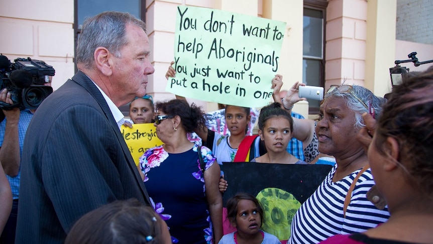 Mayor John Bowler and protesters outside the Kalgoorlie summit. November 5, 2016.