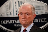 US Attorney General Jeff Sessions looks on during a news conference.