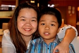 Maria Sevilla with her 10-year-old Tyrone