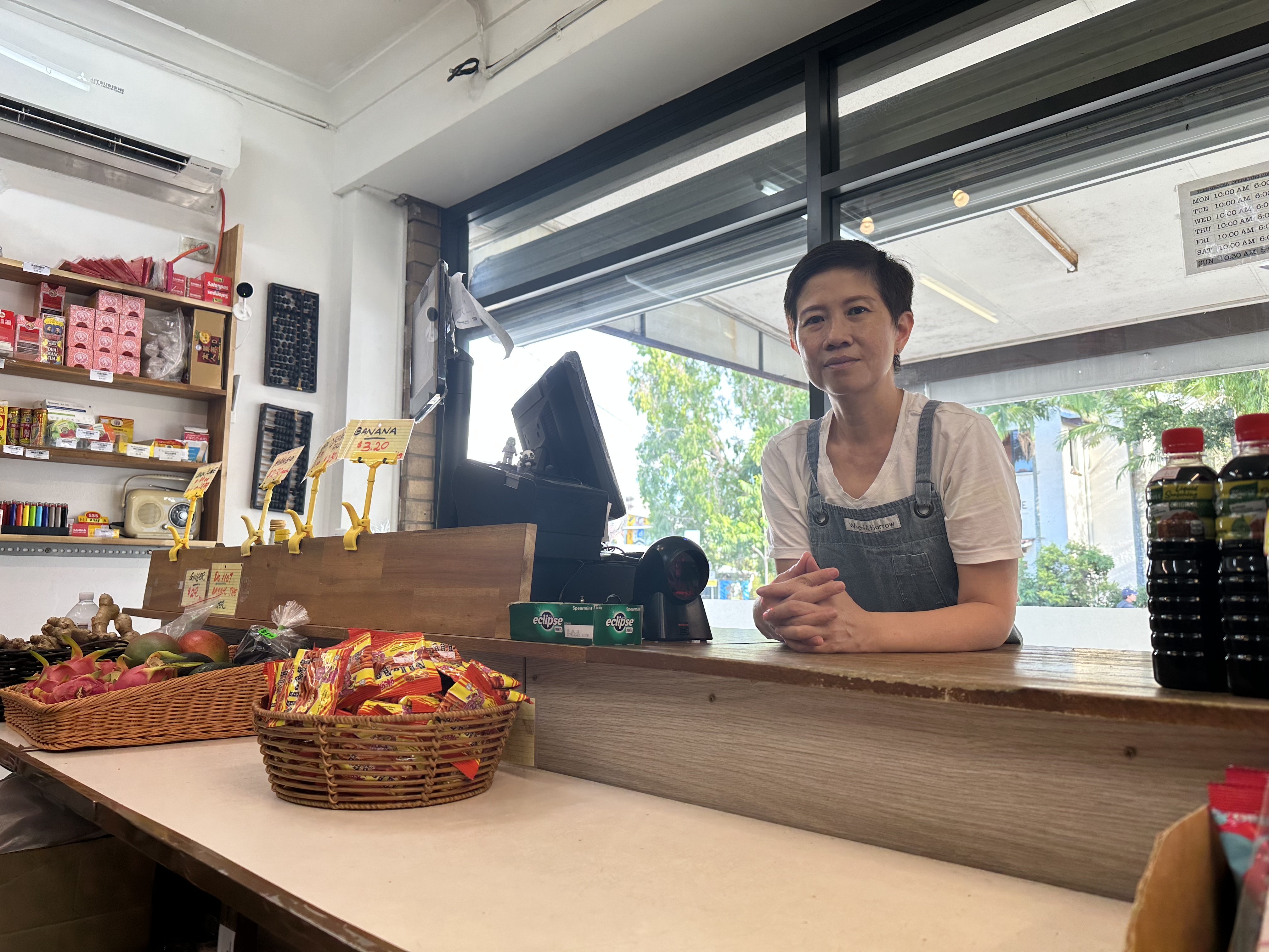 Jane Yap at the counter of the shop. 