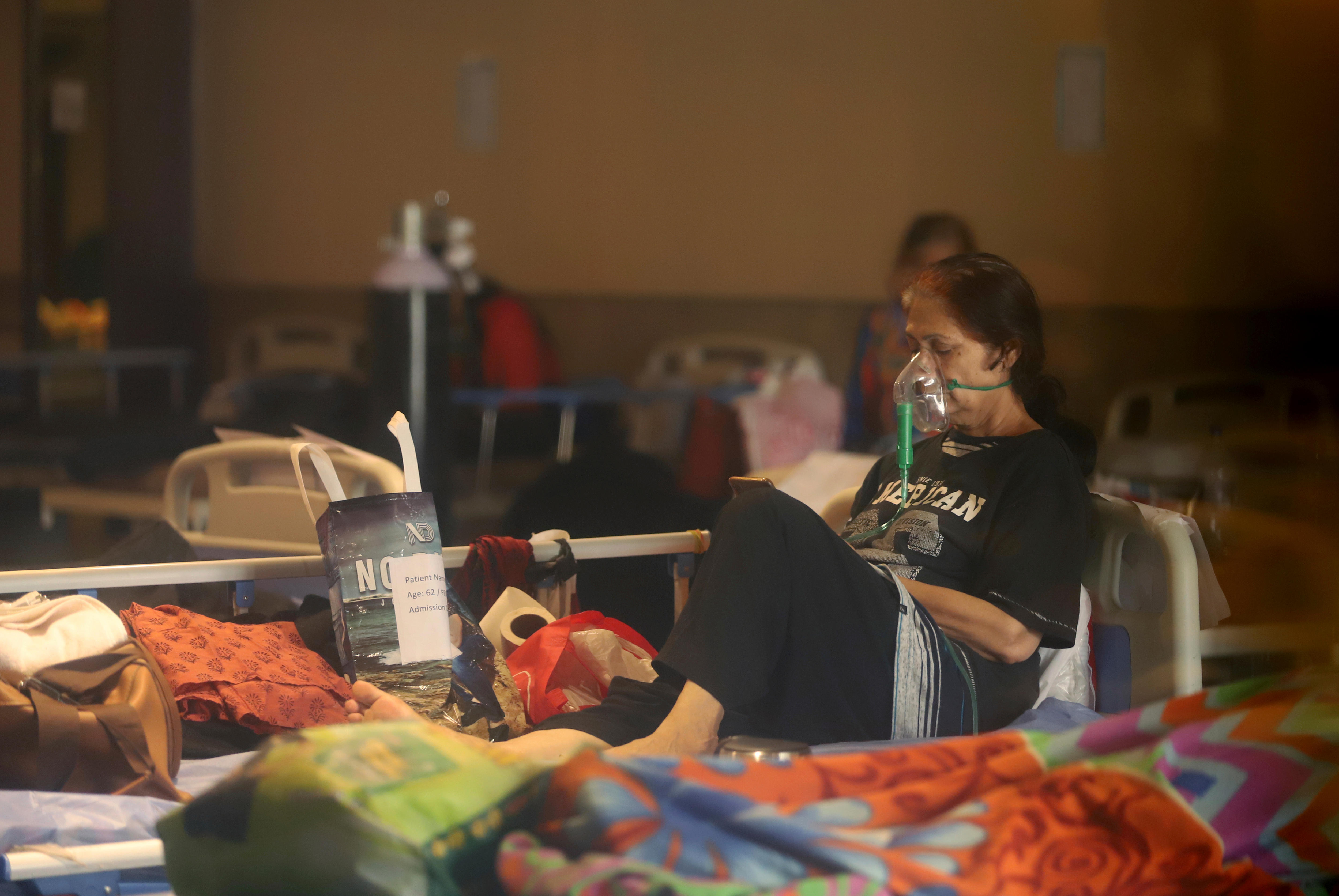 COVID-19 patient on a hospital bed.