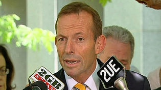 Liberal Leader Tony Abbott reacts to the news that the Emissions Trading Scheme has been voted down.