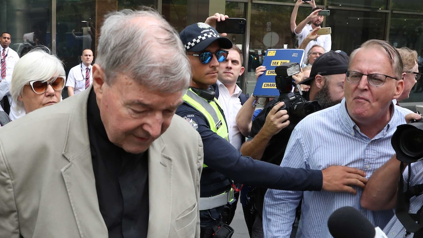 Members of the public hurled abuse at George Pell as he left court on Tuesday. (Photo: AAP)