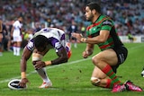 Melbourne's Sisa Waqa scores a try for the Storm against South Sydney.