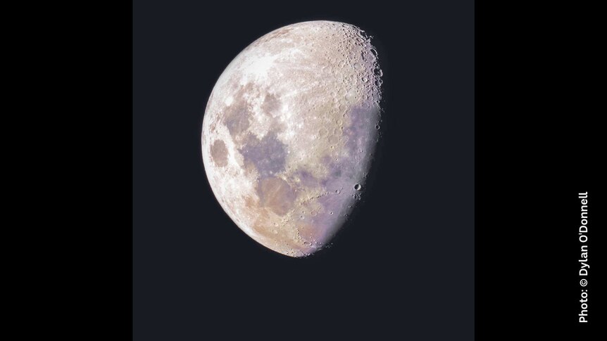Image of the waxing gibbous moon with dark blue background