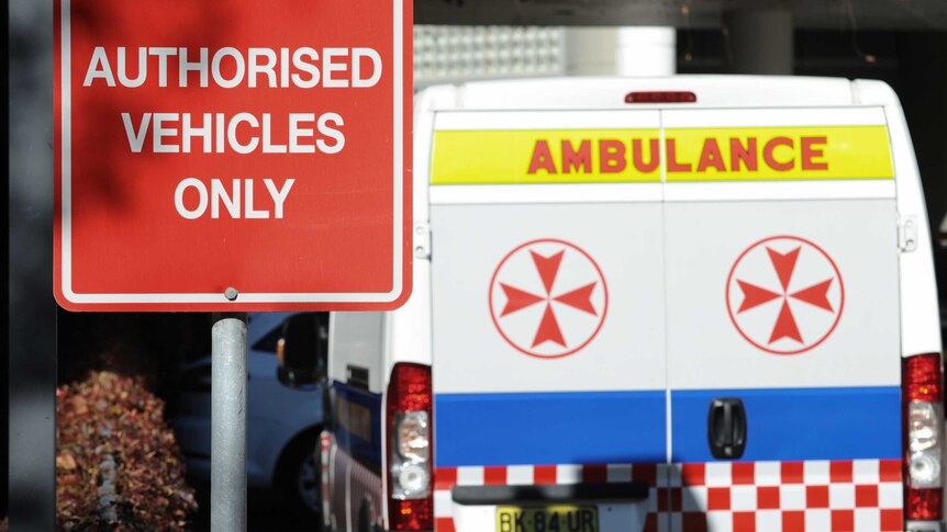 Close up of ambulances and authorised vehicles sign.