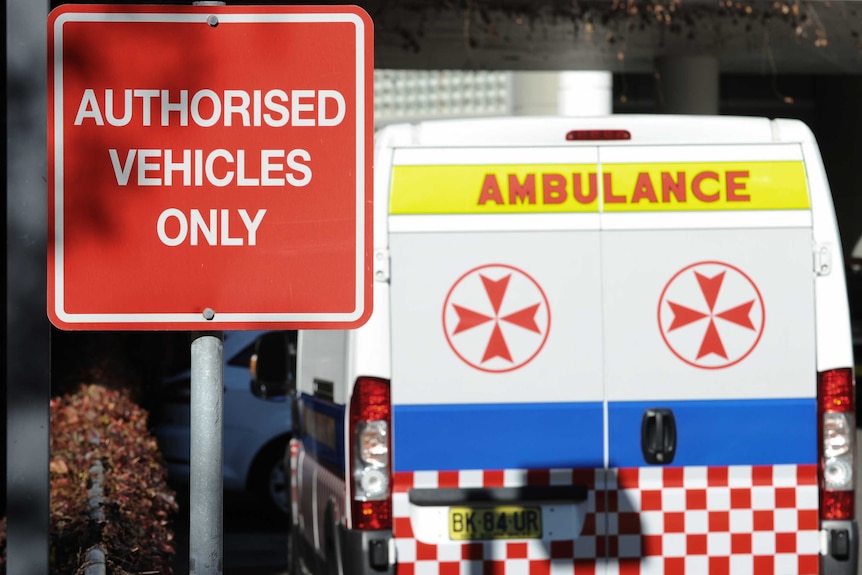 Close up of ambulances and authorised vehicles sign.