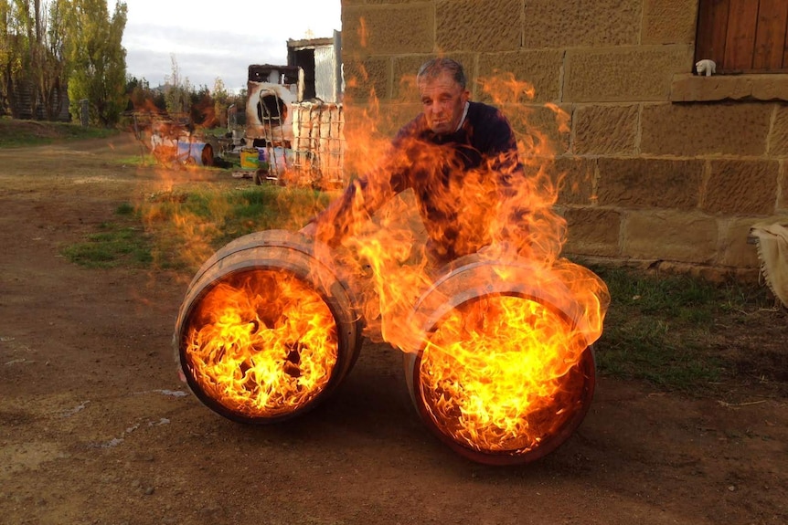 Peter Bignell burning barrels in preparation for his whisky.