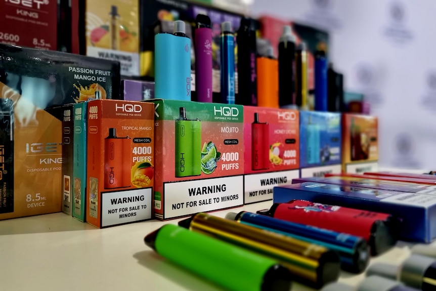 Vaping products stacked next to each other on display.